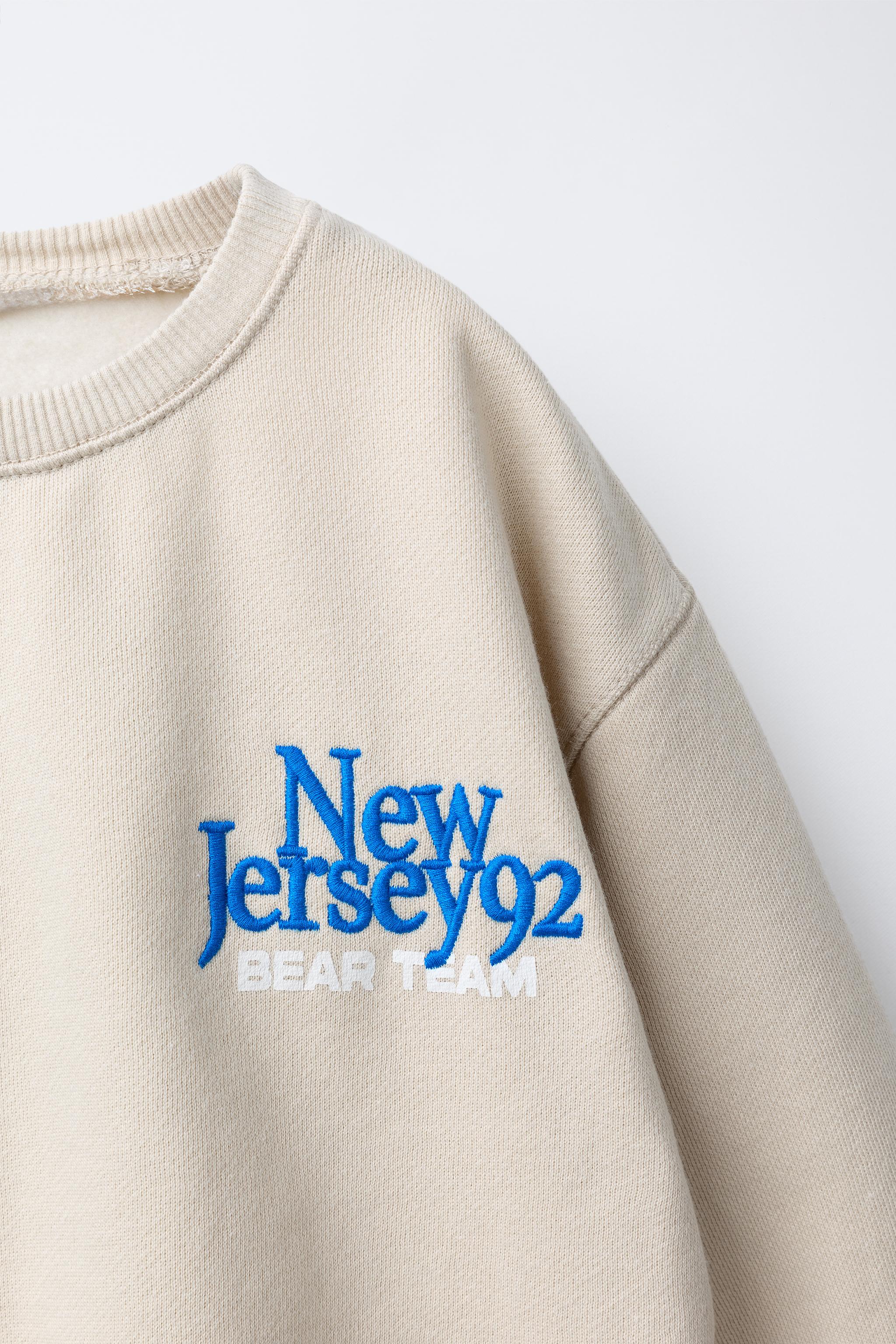 BEAR PRINT AND EMBROIDERED TEXT SWEATSHIRT